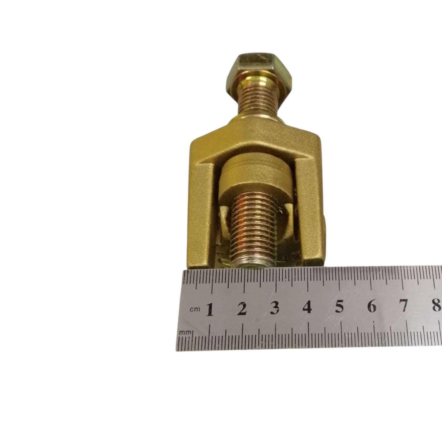 B-B Solderless Connector 2 Bolt brass clamp with hex bolts shown next to ruler for scale B-B Solderless Connector Double Bolt 380mm - 500mm Copper 750-1000MCM Electx Electrical Supply