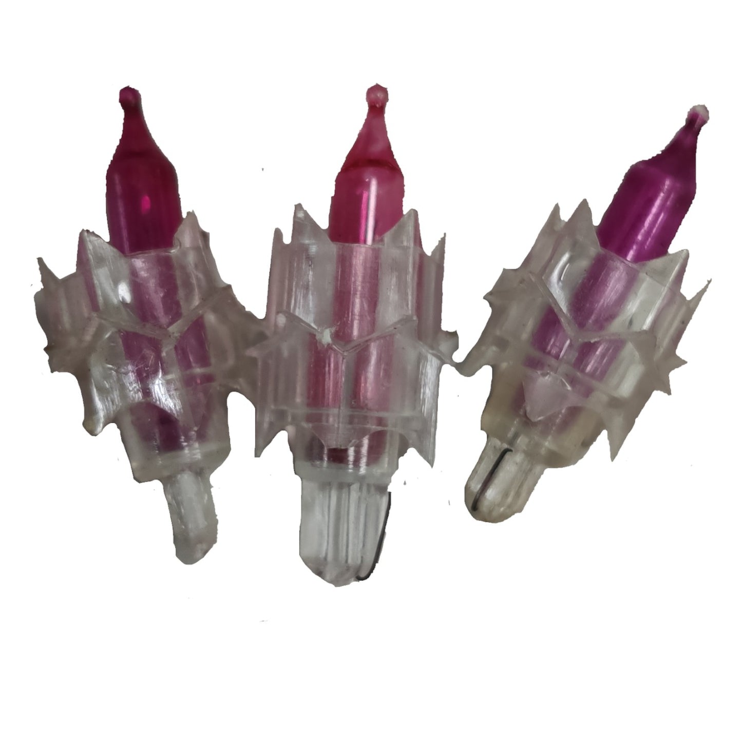 Three tattoo needles with pink tips on a white background
