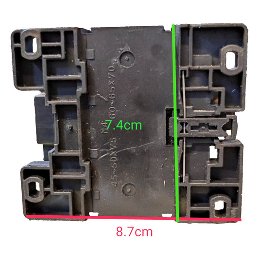 Black plastic component with measurements marked on a white background