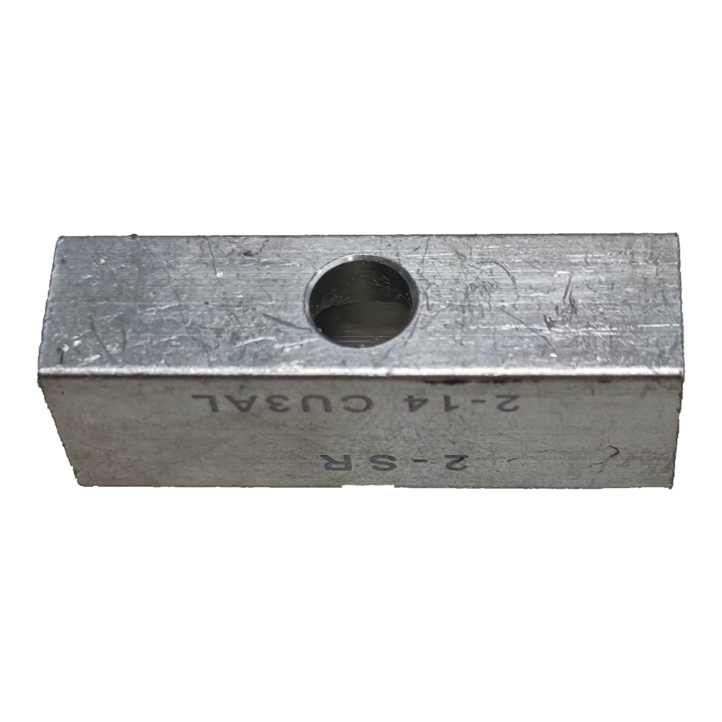 Metal block with a hole and engraved text on a white background