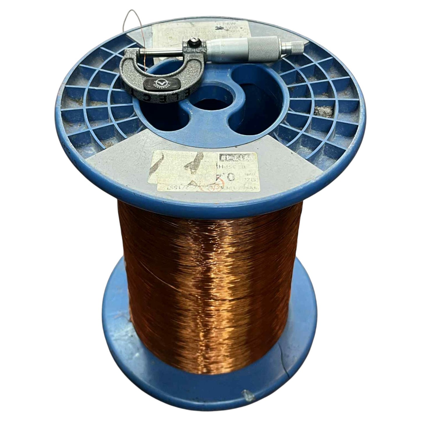 Spool of copper wire on a blue reel with visible brand name. Philflex 300 Grams Magnet Wire AWG 26 Enameled Copper Wire 0.40mm Heavy Formix Approx 247.93 Meters Per Roll Electx Electrical Supply