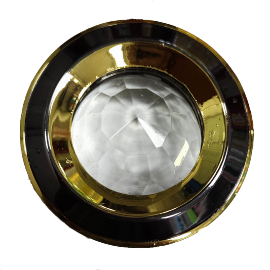 Elegant ceiling type MR16 light casing with a reflective gold finish and faceted lens for stylish illumination