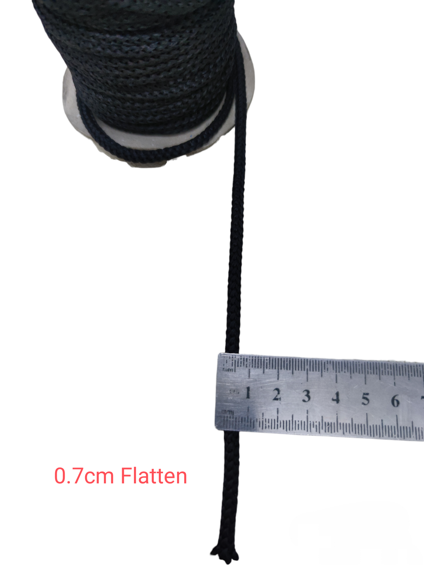 Local vendor black cloth rope per meter with 0.7cm width shown with metal ruler for measurement