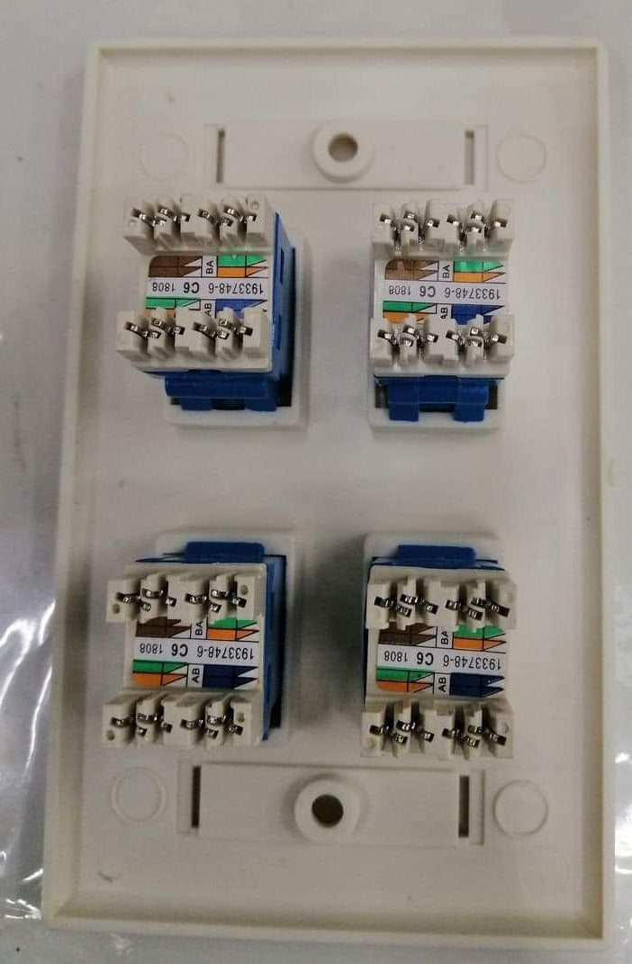 AMP 4 gang Cat 6 wall outlet with wiring terminals on white mounting plate