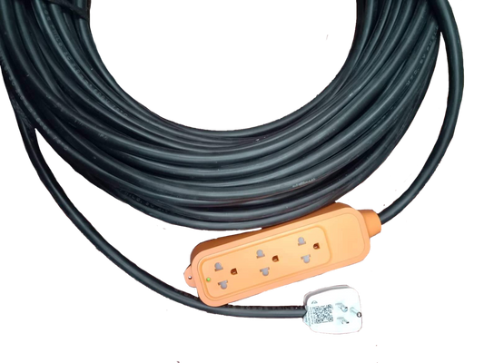 Omni & Phelps Dodge heavy duty extension cord with ground and orange power strip on black background