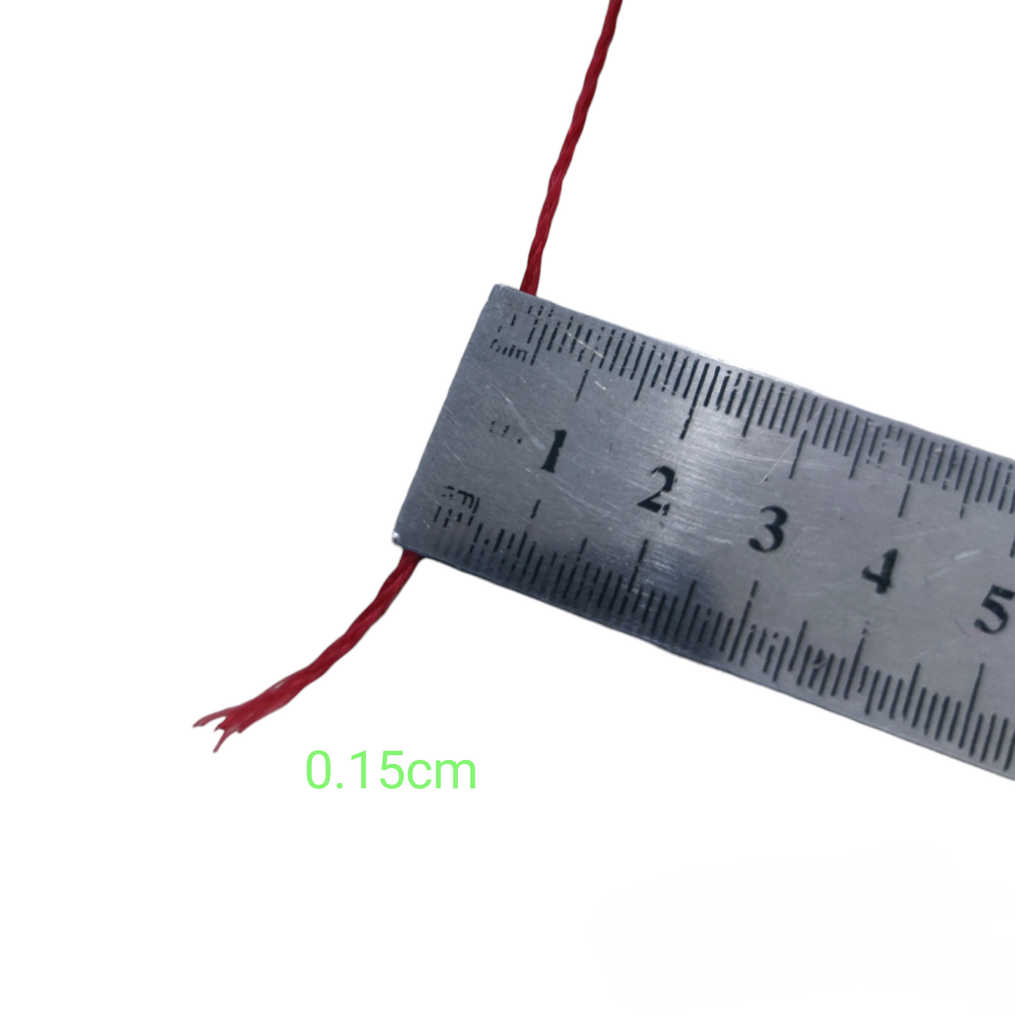 Close-up of industrial nylon rope spool red with a measuring ruler showing 0.15cm thickness