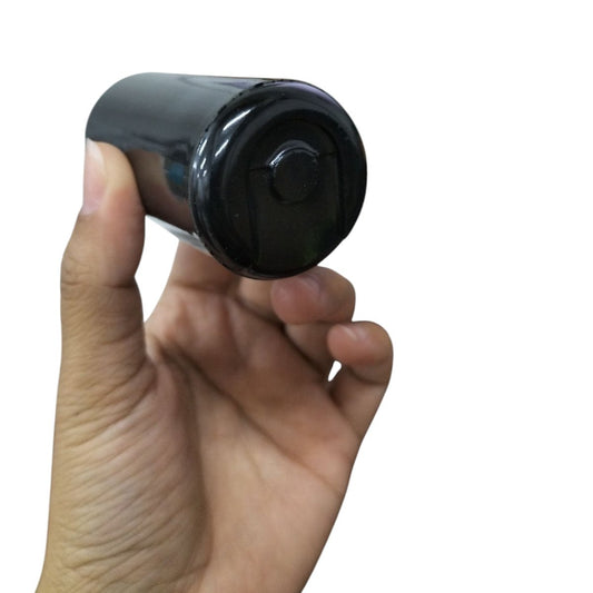 Mallory electric motor start capacitor held in hand showing cylindrical black body for electrical circuitry