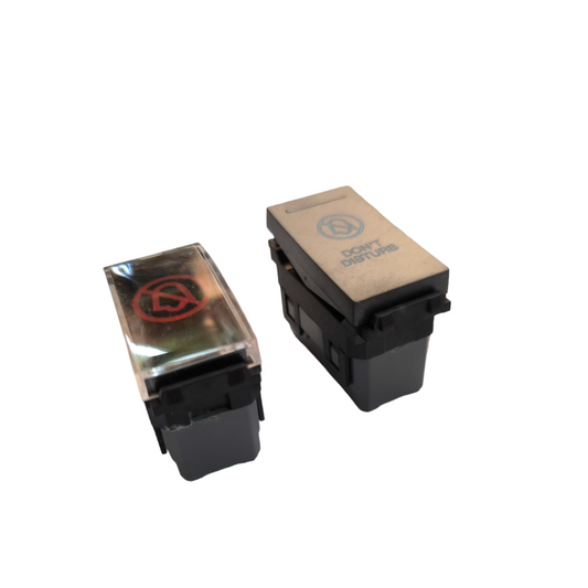 Omni power point switch with black base and translucent top featuring red and blue symbols