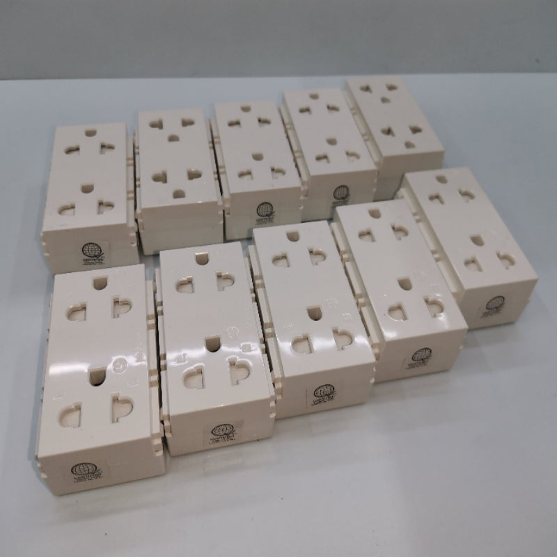 Royu Universal Outlet with Ground RWO11 multiple white electrical power sockets arranged on a surface