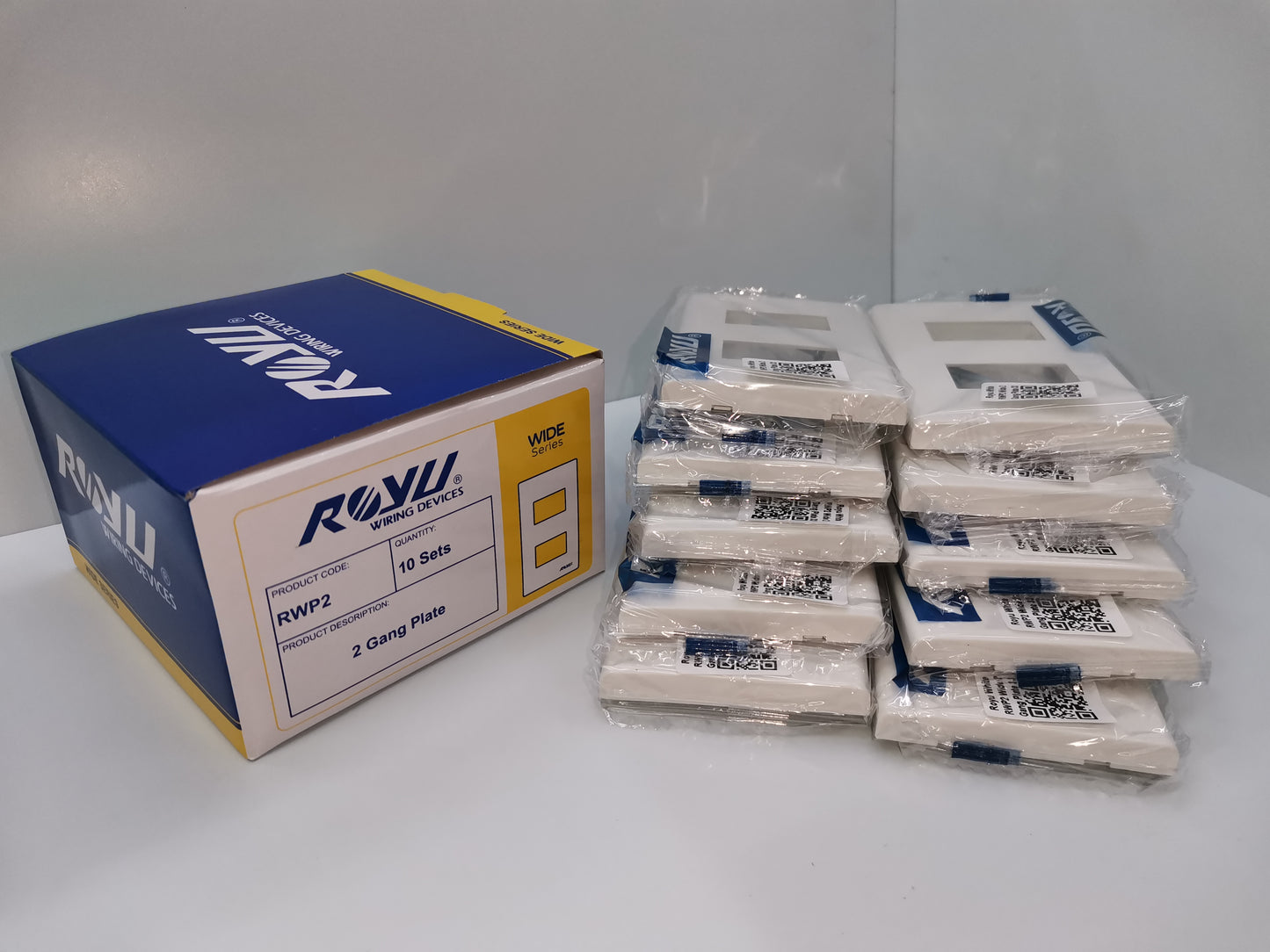 Royu 2 gang faceplate packs by Electx Electrical Supply showing multiple white faceplates and blue yellow box