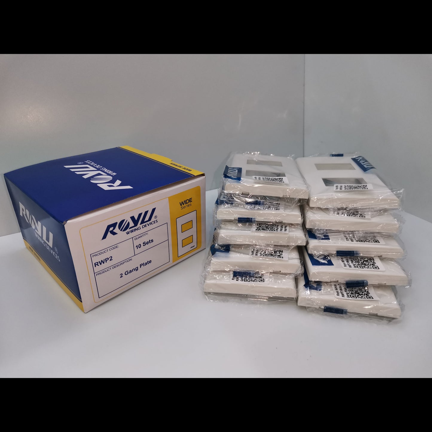 Royu 2 gang faceplate packs by Electx Electrical Supply showing multiple white faceplates and blue yellow box