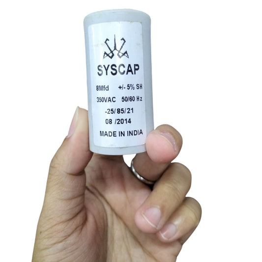 Syscap 8 Microfarad Motor Run Capacitor in a hand, rated 350VAC for reliable motor operation
