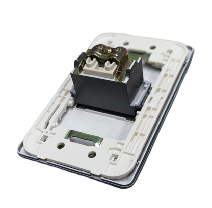 Omni 1 gang cable TV outlet power point with white mounting frame isolated on black background