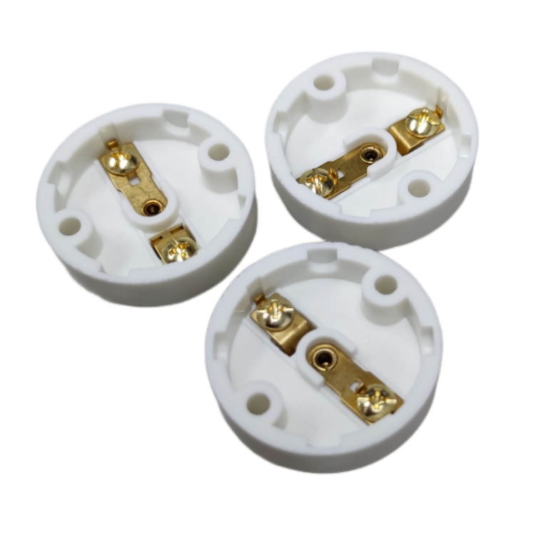 Three Omni 220V E12 sockets for candle bulbs with gold connectors for easy installation