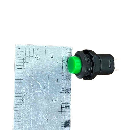 220V Green Push Lock Normally Open Switch with Measurement Against Ruler for Size Reference