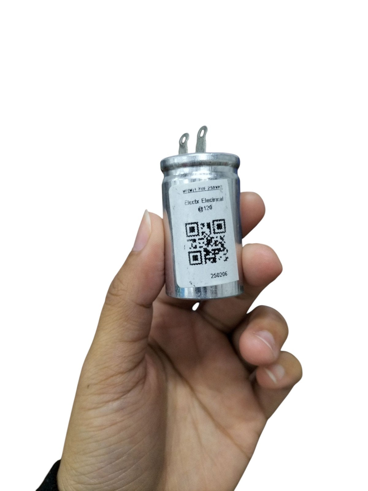 250V AC motor running capacitor in hand with silver casing and QR code label for electrical applications