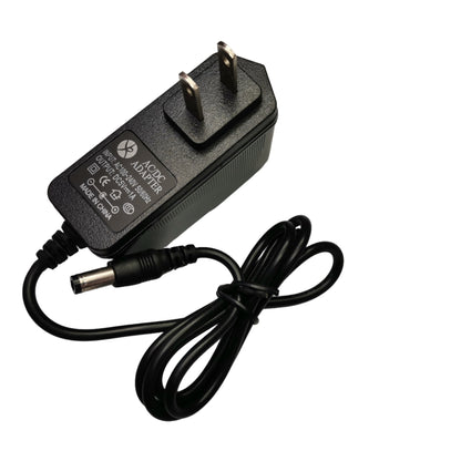 Grippes 5V 1A AC DC power adapter with a two-prong plug and a black power cord