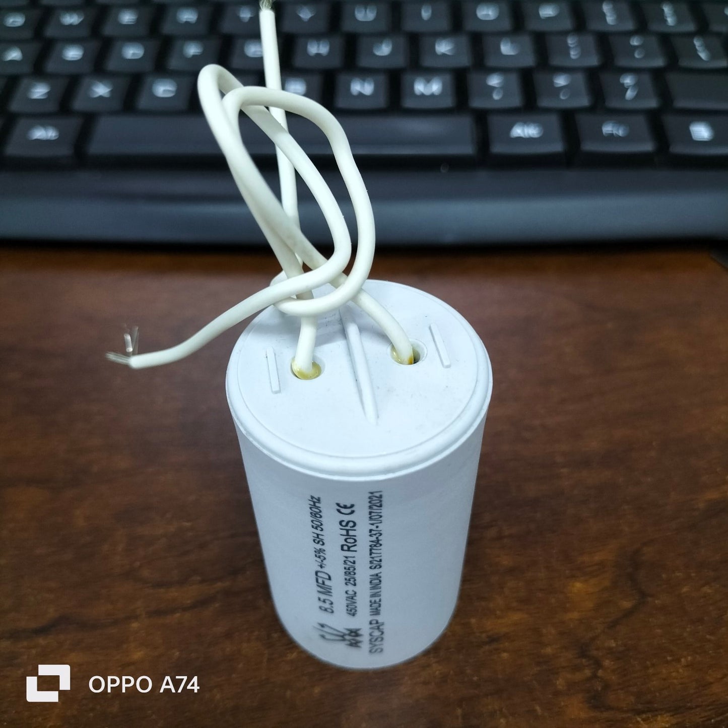 8MFD 450 VAC Running Capacitor from Syscap with connected wires for electrical applications