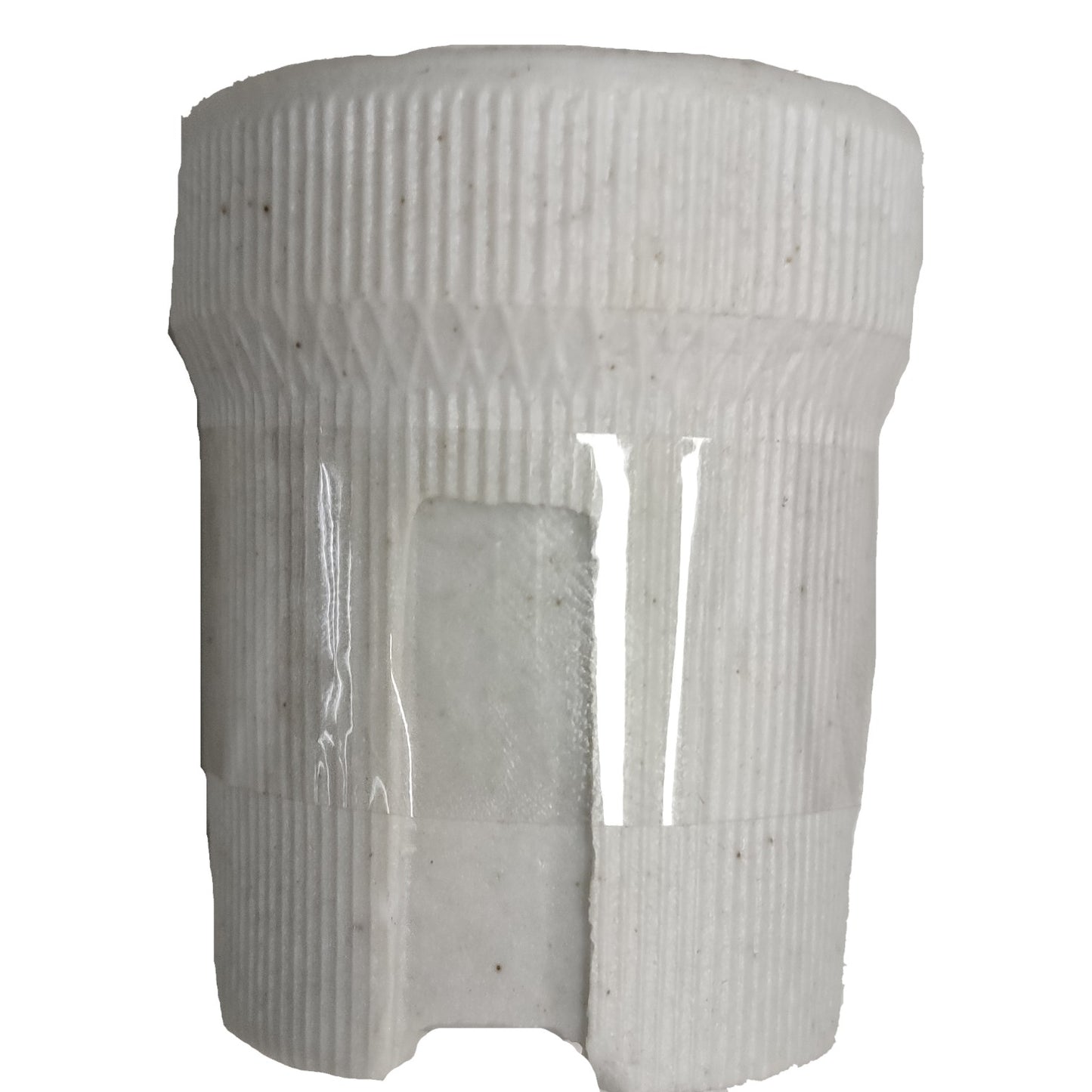 White cylindrical object with ribbed texture on a white background