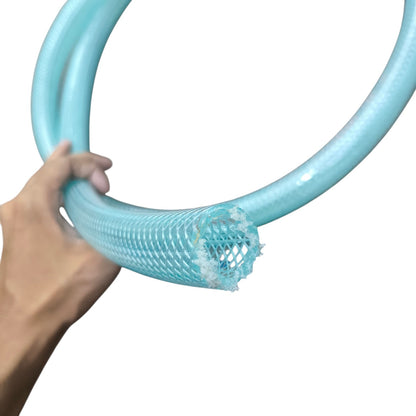 Hand holding a blue braided hose against a white background