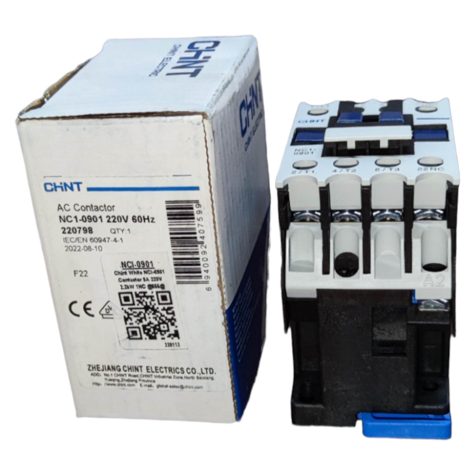 AC contactor with CHINT branding next to its packaging box on a white background