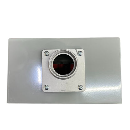 Metallic square component with circular opening on a white background