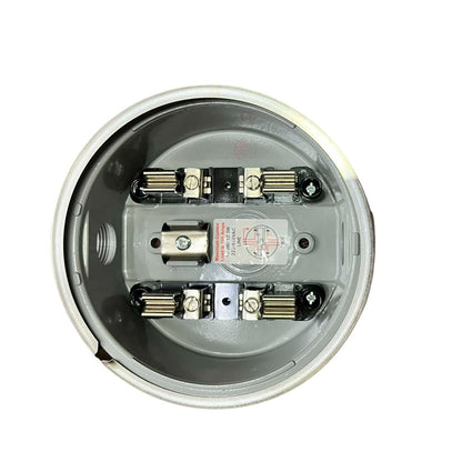 Close-up of a electrical junction box with wiring on a white background
