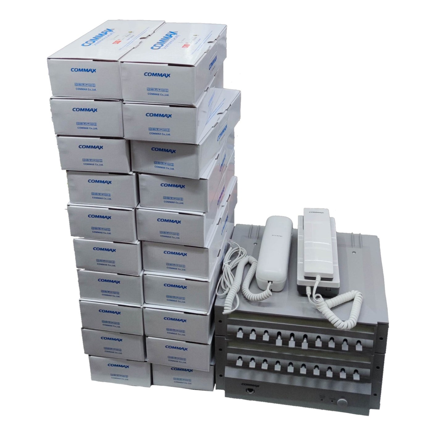 Stack of Commax boxes with a telephone set on a white background Commax 20 Station Intercom System CLS-10 Expandable With Handset T06 with Expand Unit CLS-10T(L) and 20pcs Sub-Station  1pc CLS-10 + 1pc CLS-10T(L) + 20pcs TP-S + 1pc T06 ELectx ELectrical SUpply