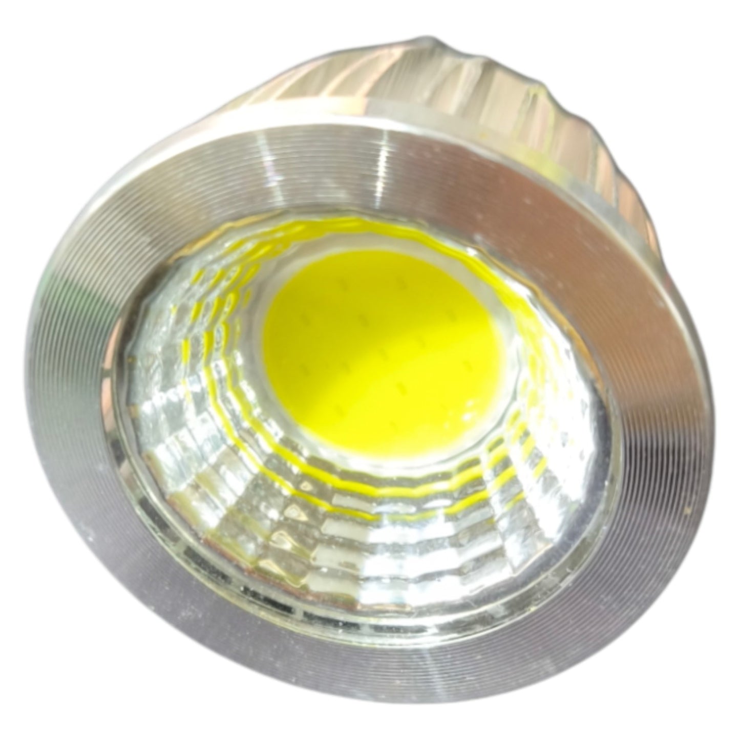 Close-up of a silver LED light bulb on a white background