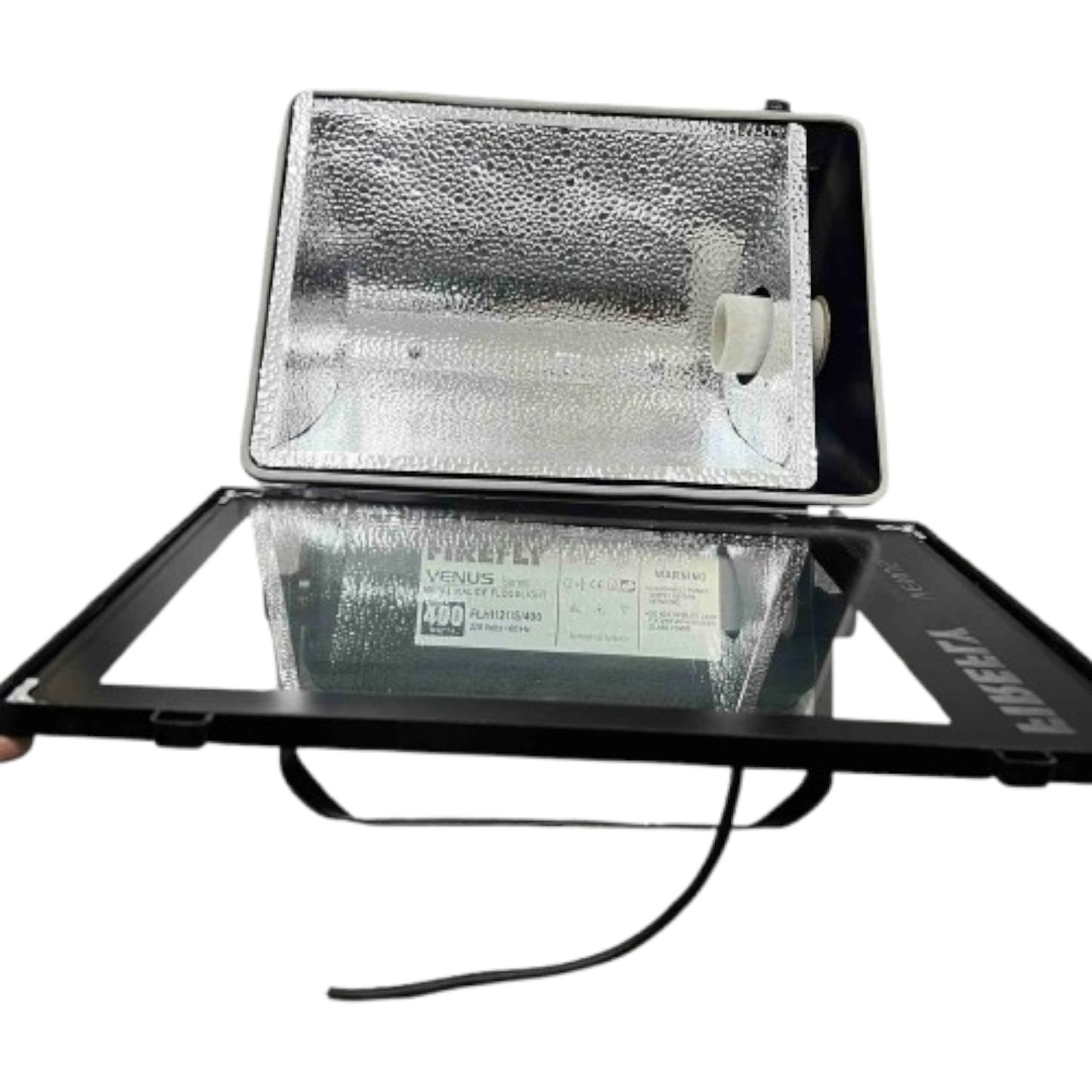 Fluorescent light fixture with reflective cover on a white background
