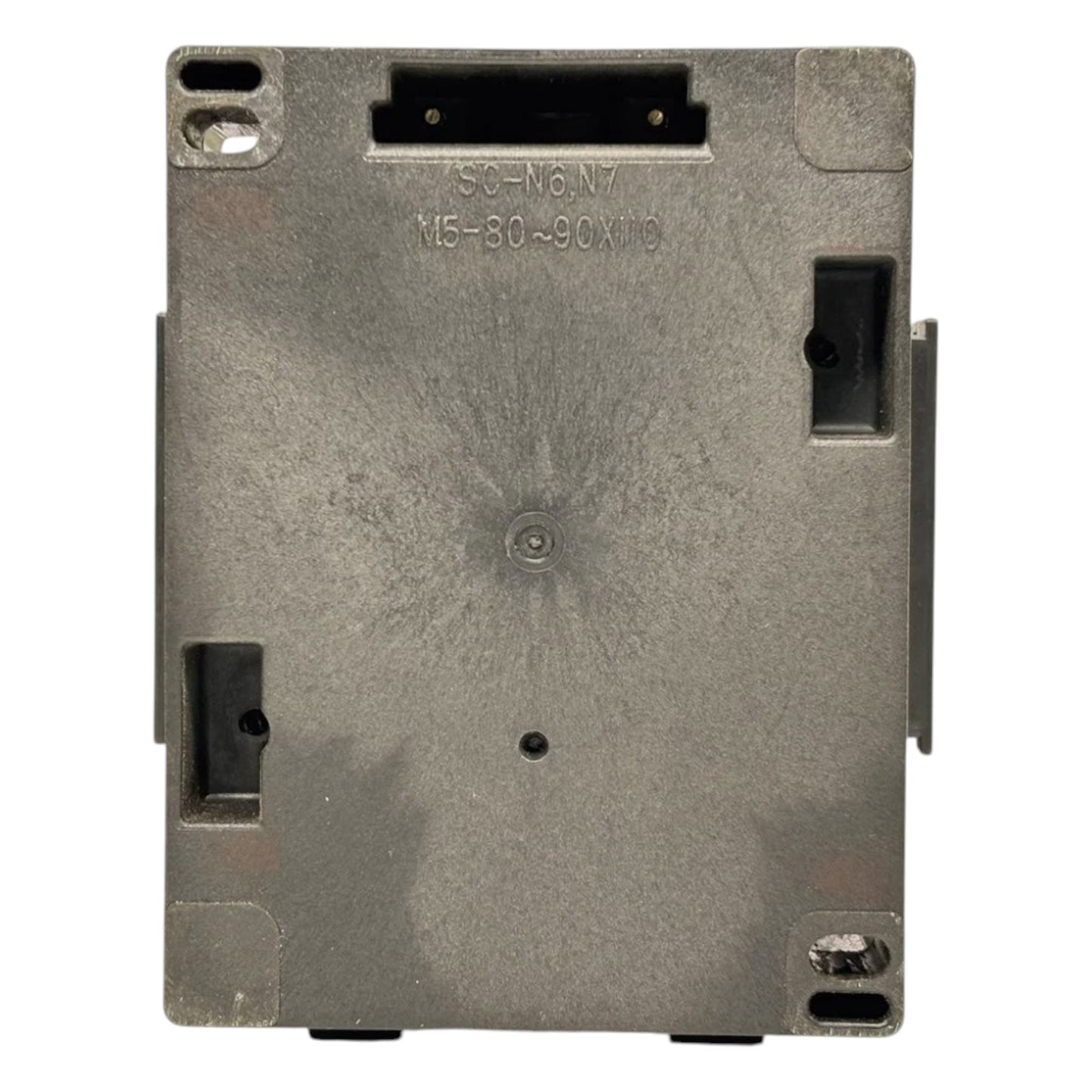 Metallic mechanical component with text and slots on a white background