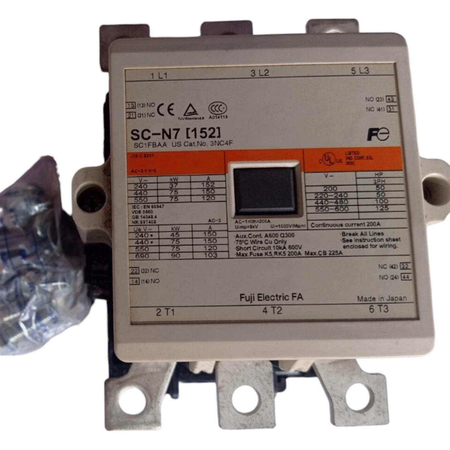 Electrical component with label and certification marks on a white background