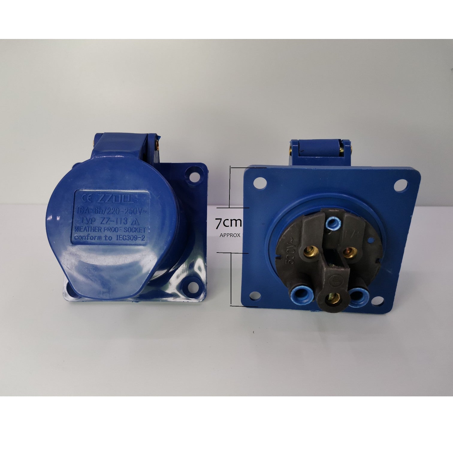 Two blue electrical connectors on a white background with a measurement  Grippes 16A 2P+E Industrial Outlet Chassis 6h 250V ( 3 Pins) IP44  IEC309-2 # 313 Electx Electrical Supplycard.