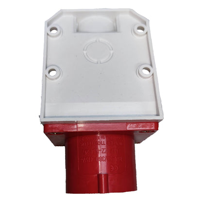 Red and white plastic component on a white background