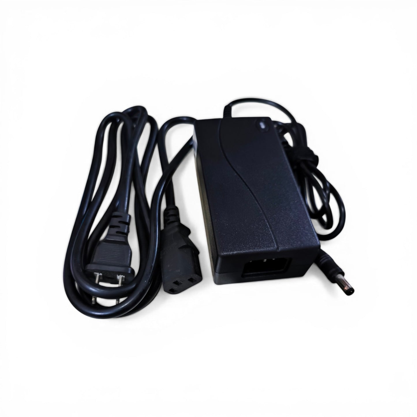 Black power adapter with cable on a white background