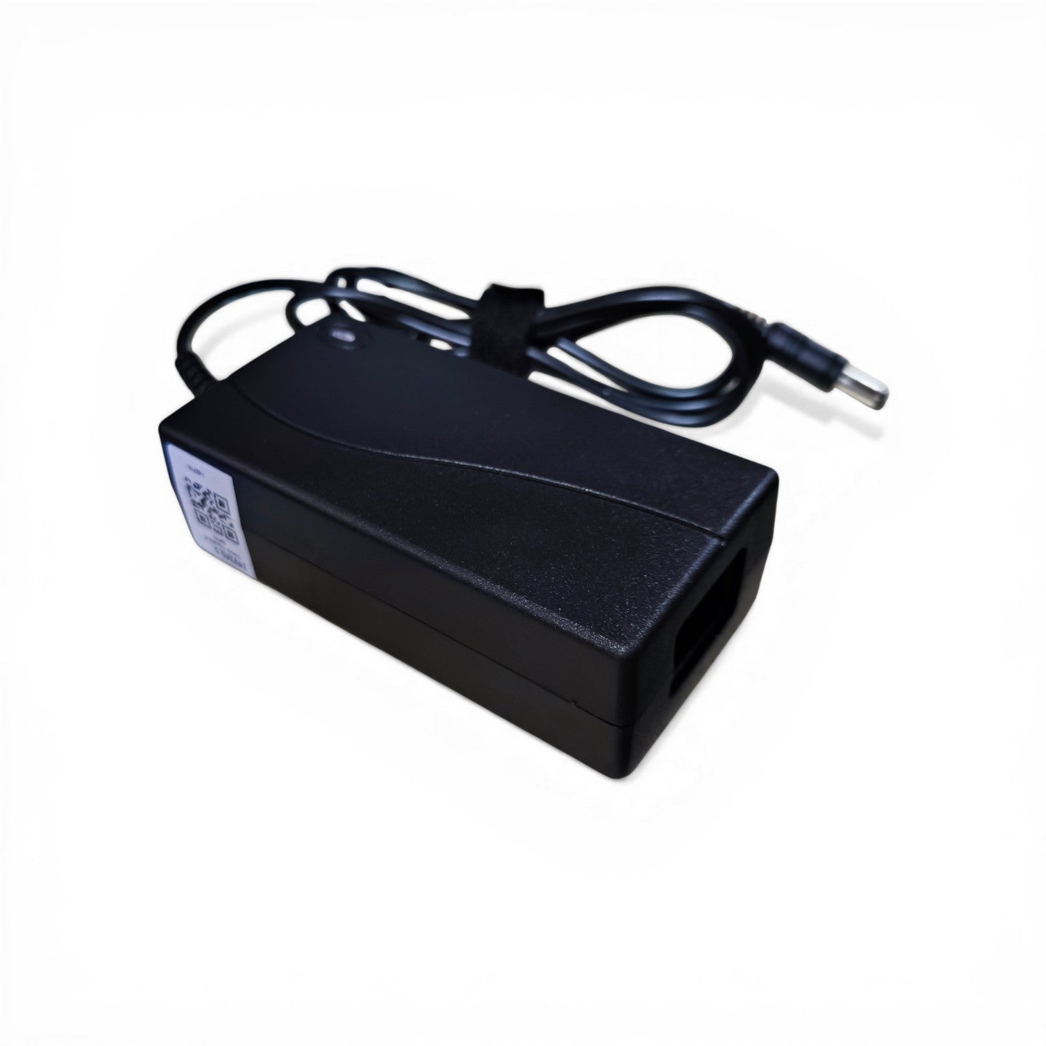 Black power adapter with a cable on a white background