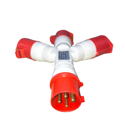 Red and white plastic fitting with multiple ports on a white background