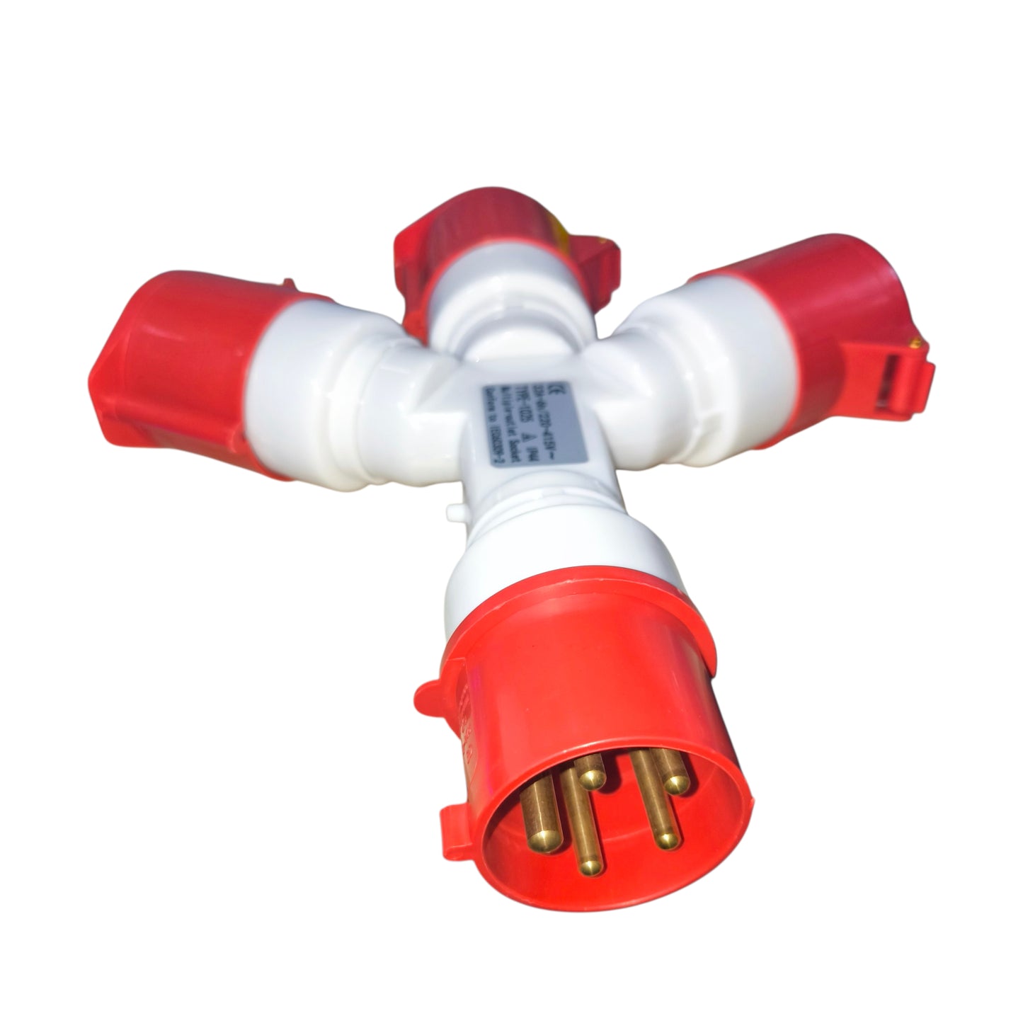 Red and white plastic fitting with gold connectors on a white background