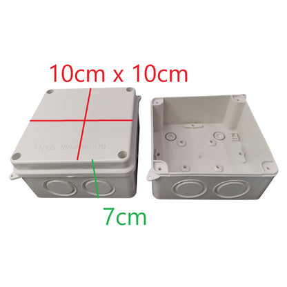 Two gray plastic boxes with measurements indicated on a white background