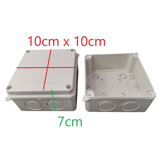 Two gray plastic boxes with measurements indicated on a white background