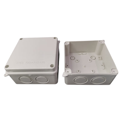 Two gray plastic boxes with circular ports on a white background