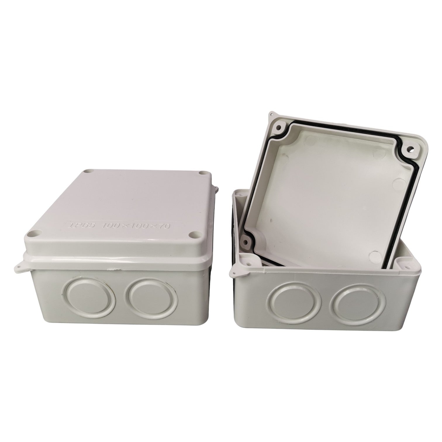 Two gray plastic boxes with circular ports on a white background