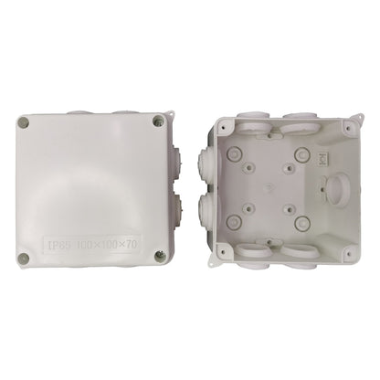 Two white plastic junction boxes on a white background