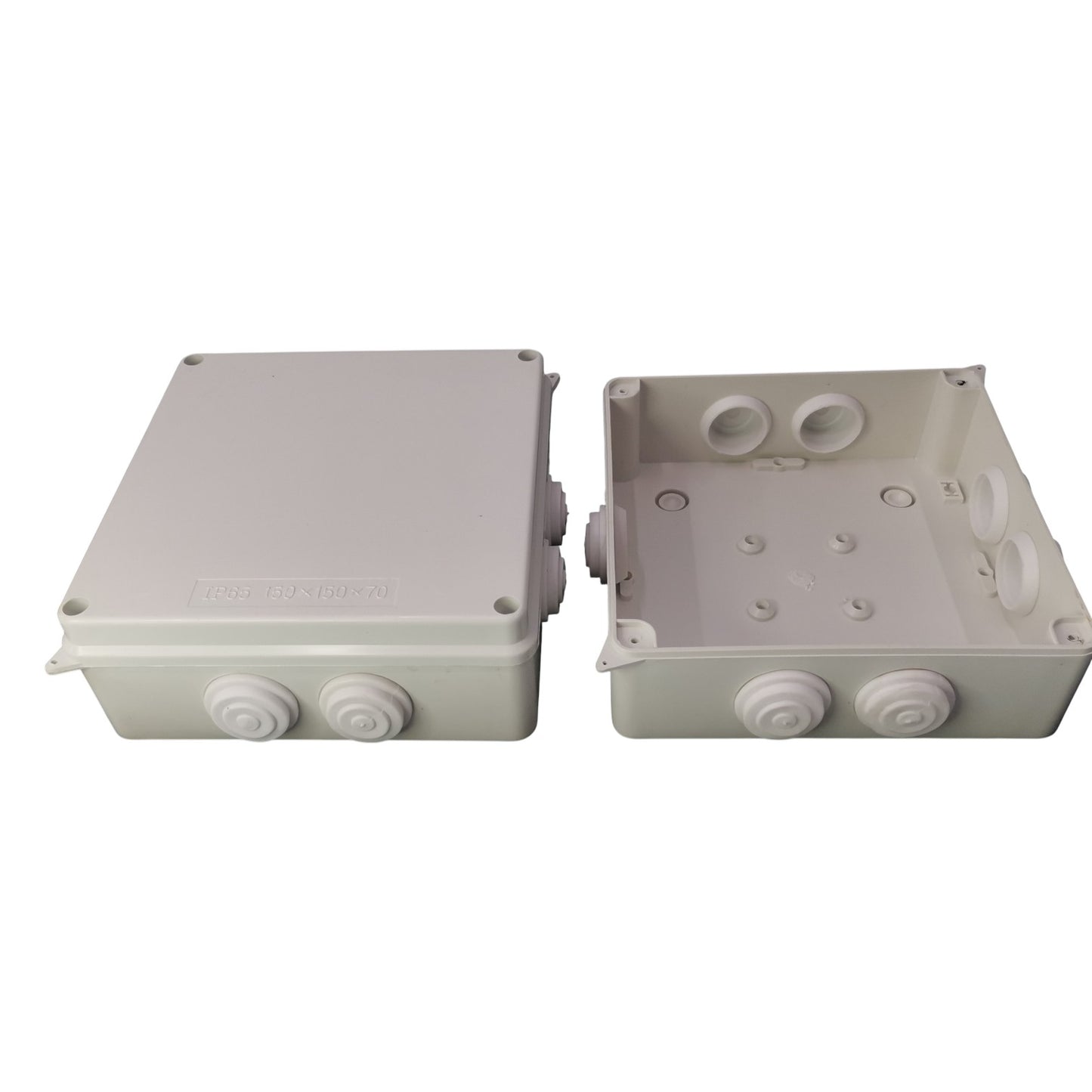 Two gray electrical junction boxes on a white background