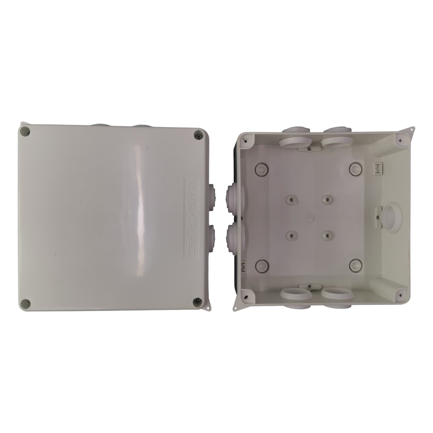 Two gray plastic junction boxes on a white background