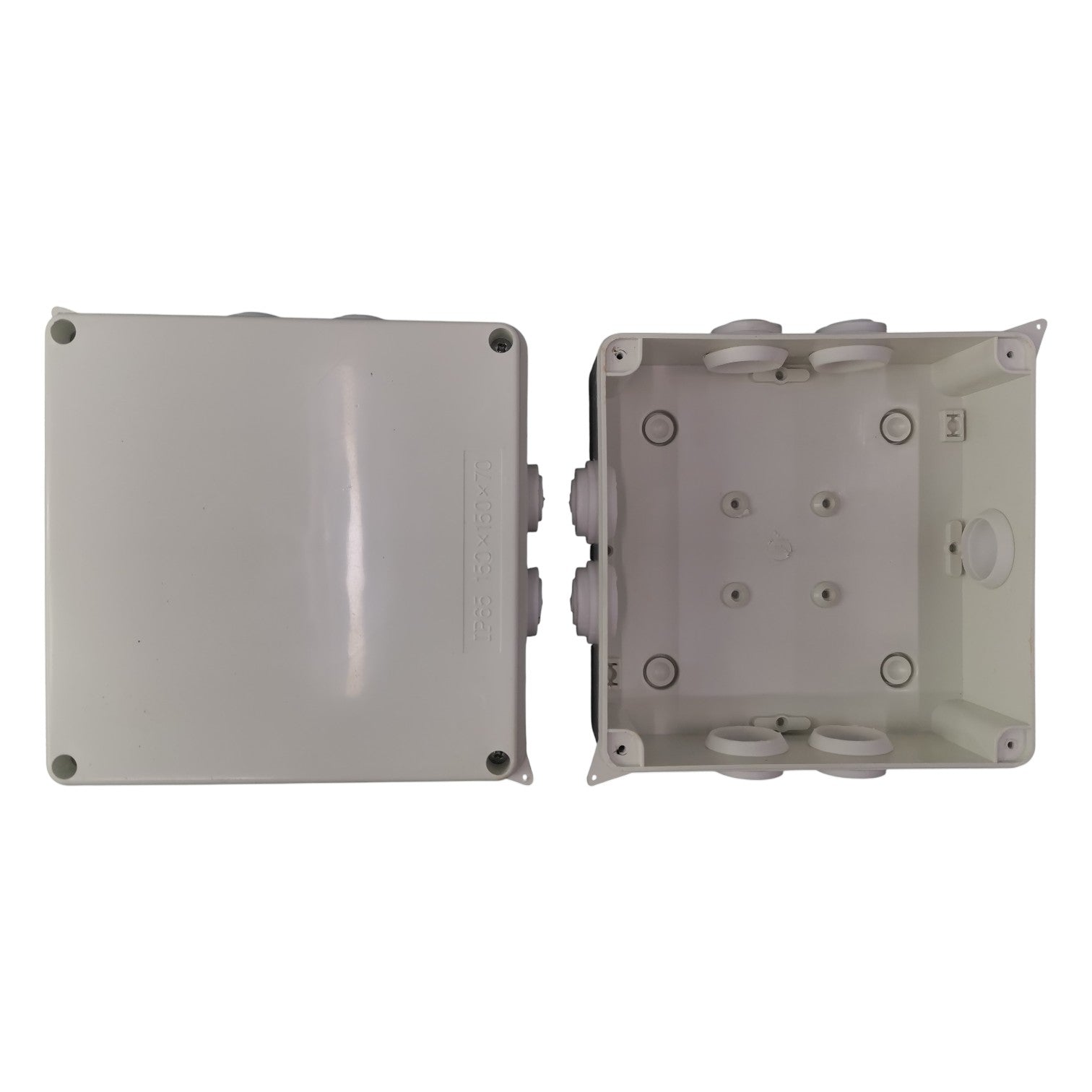 Two gray plastic junction boxes on a white background