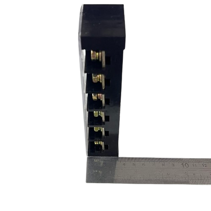 Grippes 100A 6 Pairs Terminal Block black plastic with brass screw terminals and ruler for size reference