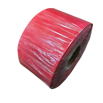 Roll of red plastic sheeting on a white background