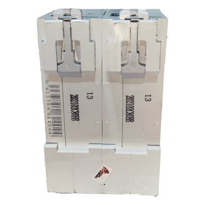 Stack of white cardboard boxes with handles on a white background