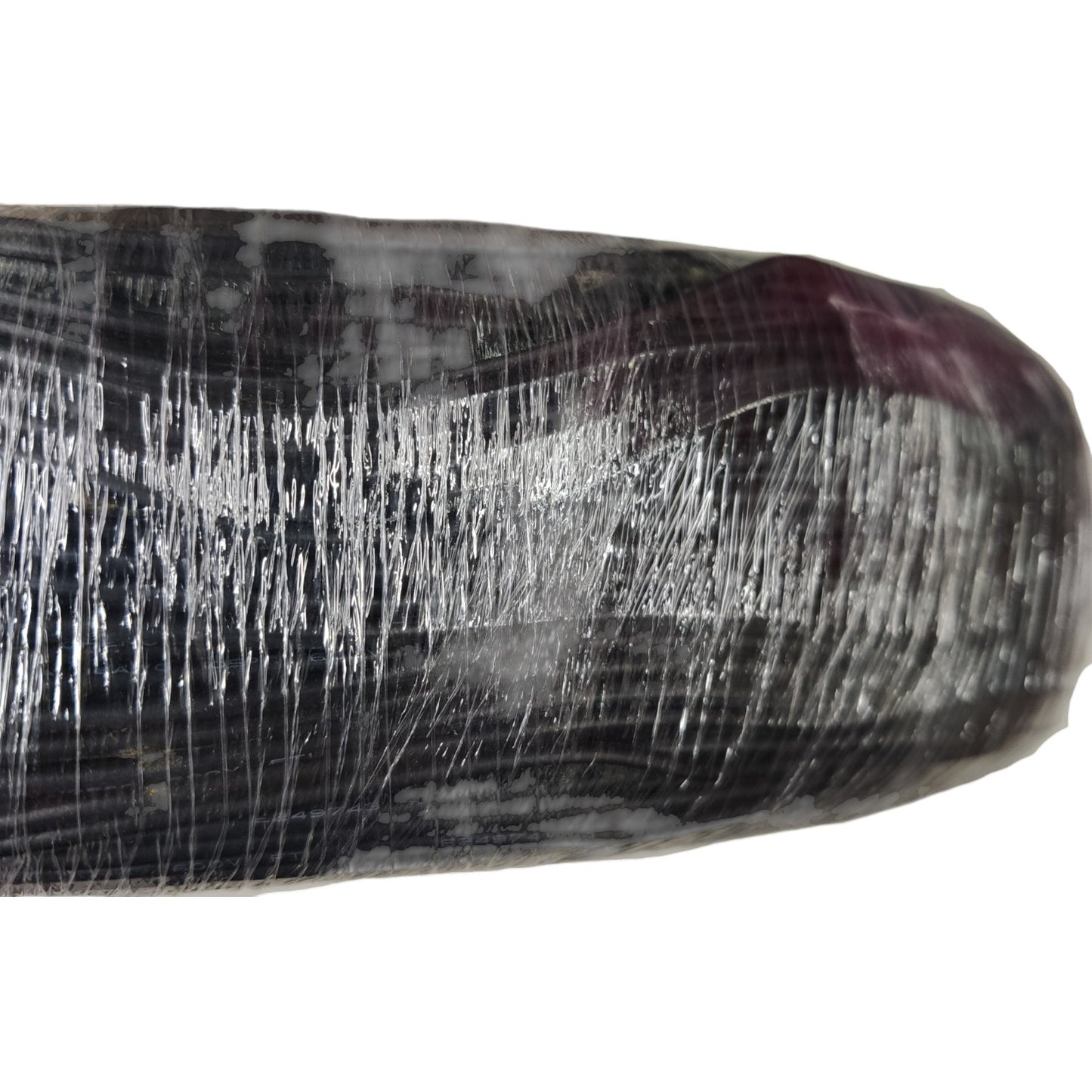 Close-up of a textured black and white object on a white background